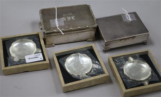A silver cigarette box, initialled, an RAF plated presentation cigarette box and six sterling silver ashtrays, cased